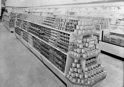 Tinned foods aisle, Woolworths store, 1956 by English Photographer